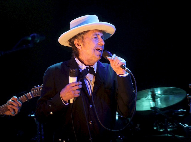 FACING CONTROVERSY. In this file photo, US musician Bob Dylan performs on stage during a concert in Benicassim, Castellon, eastern Spain, 13 July 2012. EPA/Domenech Castello