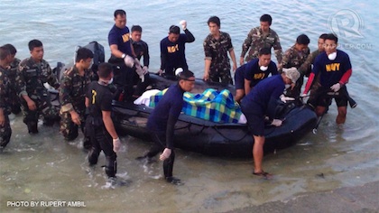BODY OF PILOT brought to shore in Masbate