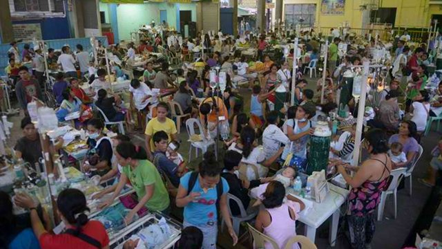 CRAMPED SHELTER. Patients are treated at a temporary shelter in Cebu following a magnitude 7.2 quake that hit Central Visayas on Tuesday. Photo by Jay Directo/AFP 