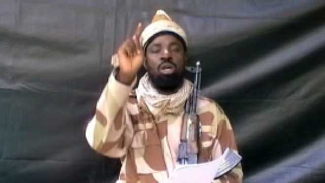 FULL SUPPORT. A grab made on July 13, 2013 from a video obtained by AFP shows the leader of the Islamist extremist group Boko Haram Abubakar Shekau, dressed in camouflage and holding an Kalashnikov AK-47. AFP PHOTO / BOKO HARAM