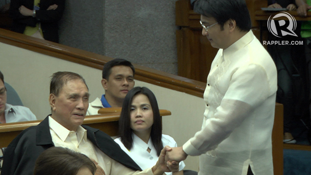 'NAME CLEARED.' Senator Bong Revilla approaches his father after delivering a speech that he says cleared the Revilla family name. Photo by Franz Lopez/Rappler 