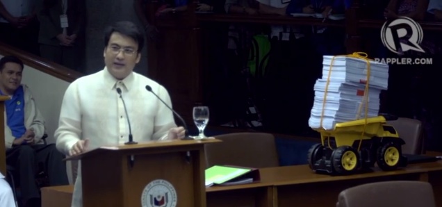 'TRUCKLOAD OF EVIDENCE.' Senator Revilla mocks the justice department, saying the evidence against him did amount to a truckload of documents, a toy truck that is. 