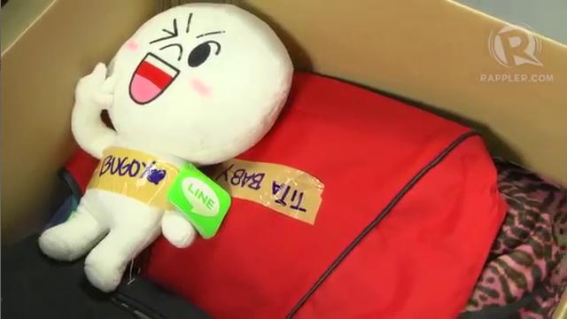 GIFTS. Balikbayan boxes are always exciting to open because of the gifts they hold. Screen grab from video