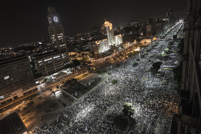 ANGER IN THE STREETS. Several hundred thousand Brazilians attend a protest against against corruption and price hikes in Rio de Janeiro, Brazil, 20 June 2013. Photo by Oliver Weiken/EPA