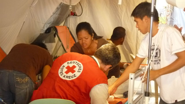 FOR WOMEN. Health workers treat a patient in the ICRC field hospital in Basey, Samar. Photo by Ana Santos/Rappler