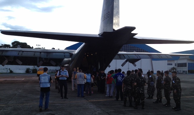 RELIEF EFFORTS. A government relief operations team prepares to leave Manila for Tacloban City to help restore communications in areas badly hit by the super typhoon. Photo by Rupert Ambil/Rappler