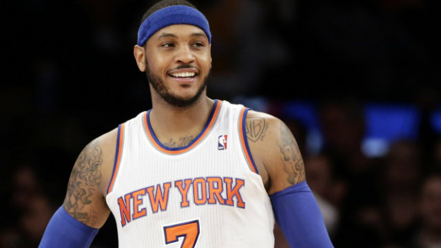 MELO STAYS. New York Knicks' Carmelo Anthony smiles during the final minutes the Knicks’ game. The free agent small forward decides to stay with the Knicks. File photo by Jason Szenes/EPA