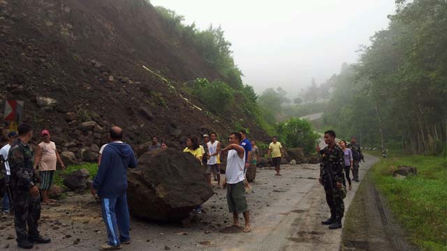 LANDSLIDE. Residents check a landslide in a road in North Cotabato on June 2, 2013, caused by the magnitude 5.7 quake centered in Carmen town, June 1, 2013. Photo courtesy of the North Cotabato provincial government
