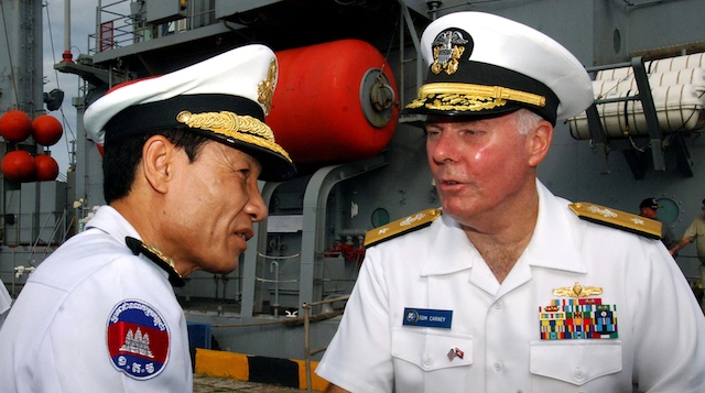 NEW COMMANDING OFFICER. Vice Admiral Tom Carney (R) greets a Cambodian officer durant the CARAT war games in 2011. Photo from US Navy