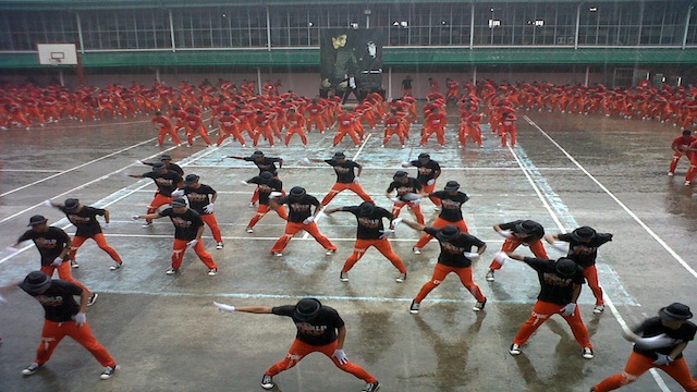 DANCIN' IN THE RAIN. Inmates at the Cebu Provincial Detention and Rehabilitation Center perform their version of Py's Gangnam Style before a crowd of tourists. Photo taken by Ryan Christopher J. Sorote 