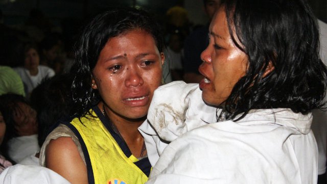 ALIVE. Rescued Filipino survivors arrive at a port in Cebu city. Photo by EPA/Julius Theo Castroverde