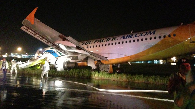 OVERSHOOT. Cebu Pacific flight 5J 971 overran the Davao City airport runway and hit its uncemented portion evening of Sunday, June 2. Photo by Laiza Dale A. Lacida