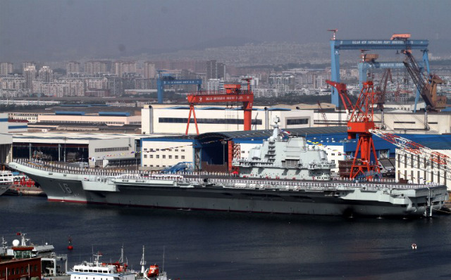 THREATENING PH? China's first aircraft carrier, the 'Liaoning' sits berthed at the naval base in Dalian, northeast China's Liaoning province on Sept 25, 2012. File photo by AFP