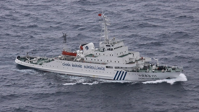 This handout picture taken on December 17, 2012 shows a Chinese marine surveillance ship cruising near the disputed islands known as Senkaku islands in Japan and Diaoyu islands in China, in the East China Sea. Four Chinese government ships entered a band of water around the disputed islands. On December 17, hours after the scale of his win became apparent, Shinzo Abe re-staked Tokyo's claim to sovereignty of islands at the center of a debilitating spat with China. FILE AFP PHOTO / JAPAN COAST GUARD