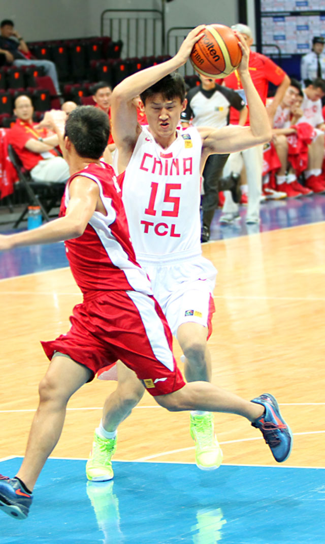 China possesses the height and might to silence Chinese Taipei. Photo by FIBA Asia/Nuki Sabio.