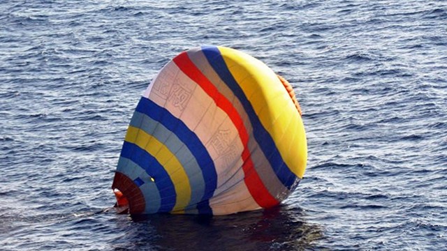 FAILED ATTEMPT. A hot air balloon carrying a Chinese man lands on the water, south of the disputed islets known as the Senkaku islands in Japan and Diaoyu islands in China, in the East China Sea. Photo from the Japan Coast Guard/AFP 