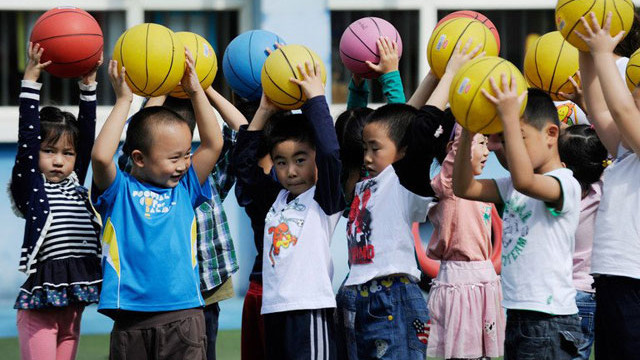 CHINA'S FUTURE. This picture taken on September 19, 2012 shows children playing at a kindergarten in Beijing. AFP/WANG ZHAO