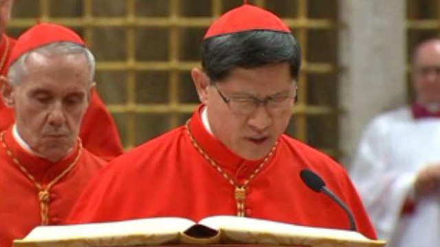PAPAL CONTENDER. Manila Archbishop Luis Antonio Tagle takes an oath of secrecy during the conclave. Photo from news.va's Facebook page