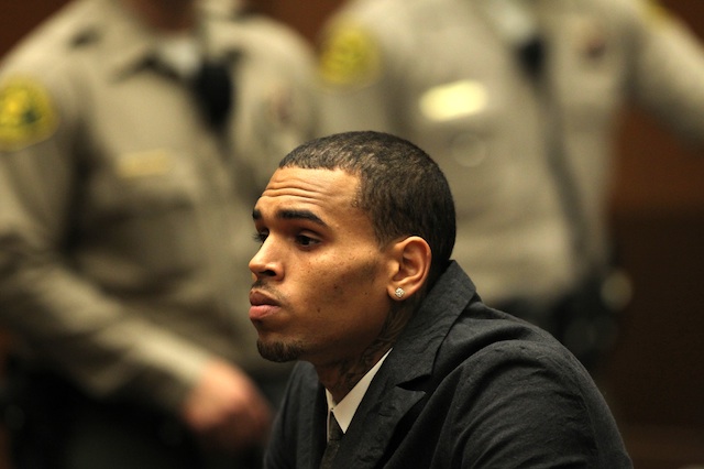 IN HOT WATER - AGAIN. In this file photo, US singer Chris Brown appears in court for a probation violation hearing at the Criminal Justice Center in Los Angeles, California, USA, 06 February 2013. Photo by EPA/David McNew/Pool
