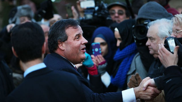 SAYING SORRY. New Jersey Gov. Chris Christie shakes hands with residents after leaving the Borough Hall in Fort Lee on January 9, 2014. Spencer Platt/Getty Images/AFP
