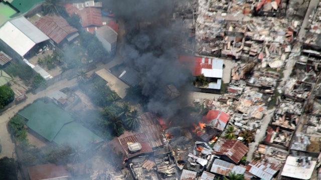 BURNED HOUSES: In the end, over 10,000 houses were damaged inside the Zamboanga City combat zone. File photo courtesy of the Philippine Air Force