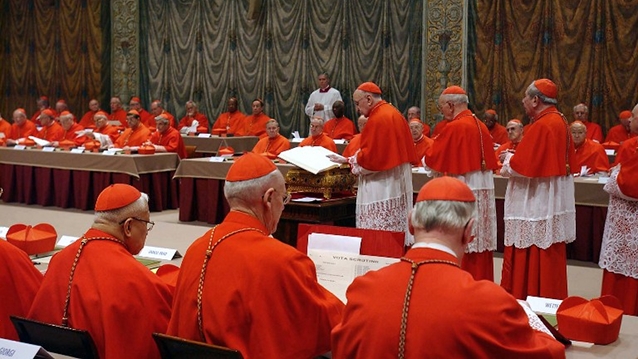 OATH-TAKING. Putting their hands on the Holy Gospels, cardinals vow to keep conclave proceedings secret. File photo from AFP