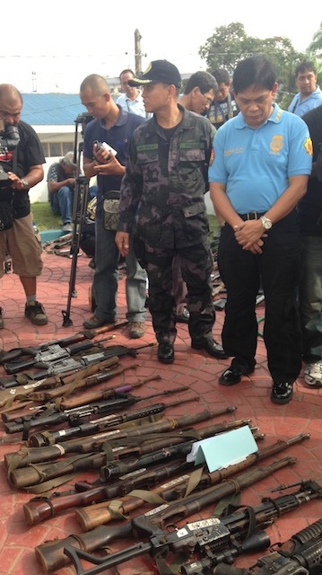 HEAVY-POWERED FIREARMS: PNP-CIDG present firearms confiscated from the MNLF fighters in Zamboanga City. Photo by Carmela Fonbuena/Rappler