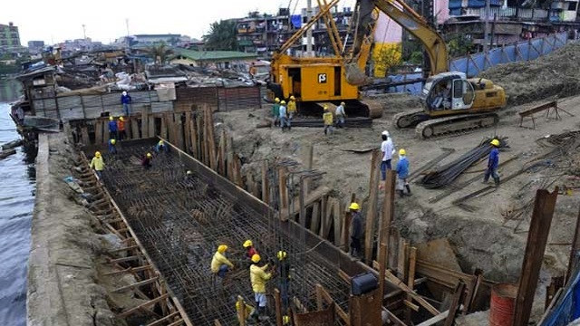 FLOOD CONTROL. Flood control operations are important even in flood-prone Navotas. AFP file photo 