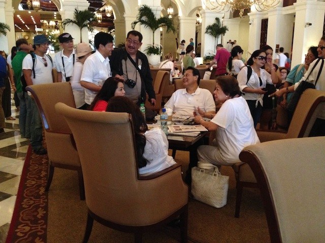 PREPPING FOR #MILLIONPEOPLEMARCH. Former Chief Justice Renato Corona (seated, center) at the Manila Hotel, August 26, 2013. Photo by Rappler/Bea Cupin