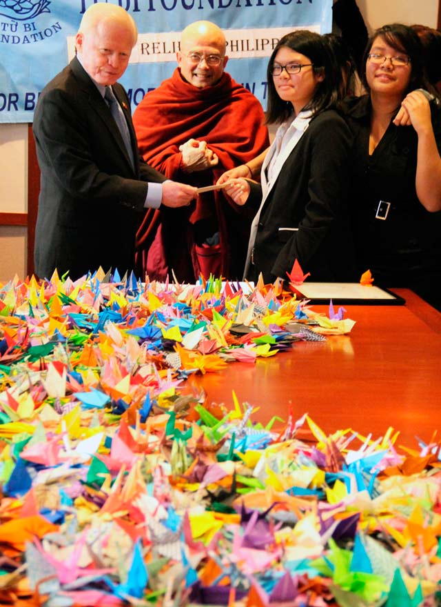 YOLANDA DONATIONS. Ambassador Cuisia with members of the Vietnamese community who turned over donations for victims of Typhoon Yolanda. Photo by Majalya Fernando/Philippine Embassy