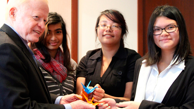 1000 PAPER CRANES. Tenth grader Francis Nguyen turns over to the Philippine Embassy in Washington, DC the proceeds of her paper crane folding fund-raising project. Photo by Majalya Fernando/Philippine Embassy