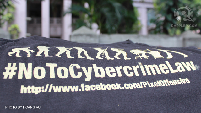 TRO ISSUED. Anti-cybercrime groups protest outside the Supreme Court while they waited for the ruling on Tuesday