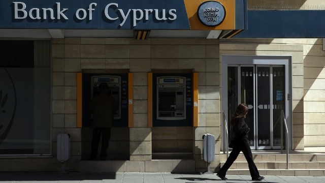 RESIGNATION. Cyprus central bank chief Panicos Demetriades resigns following Cyprus' banking crisis last year. AFP PHOTO/YIANNIS KOUTOGLOU