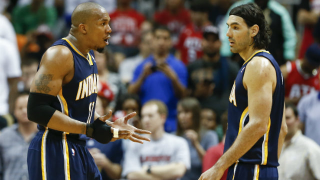 OUTPACED. Indiana Pacers forward David West (L) vents his frustrations with Indiana Pacers forward Luis Scola (R) during Game 3. The team has been struggling to find answers against the Atlanta Hawks. Photo by Erik S. Lesser/EPA