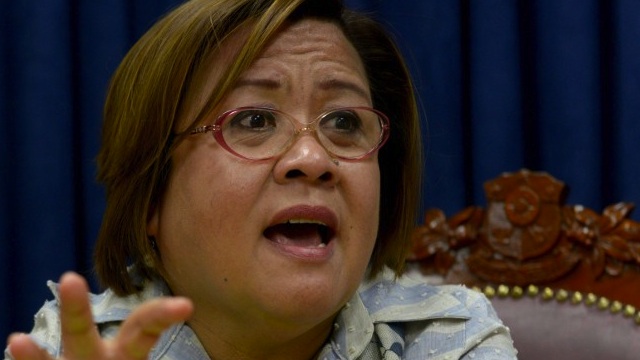 HUNT DOWN. Justice Secretary Leila de Lima orders the NBI to investigate and hunt down the alleged recruiter of the executed Filipino national in China. FILE/AFP PHOTO / Jay DIRECTO