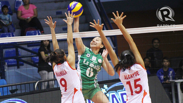 DOMINANCE. Lady Spiker Desiree Cheng slams home one of her 8 points. Photo by Josh Abeleda