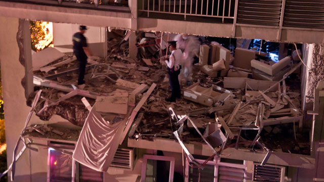 POWERFUL EXPLOSION. Damaged portions of Two Serendra. Photo by Robin Leonard