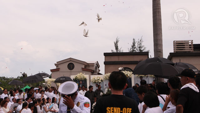 DOVES. They are released at the burial site. Photo by Geric Cruz