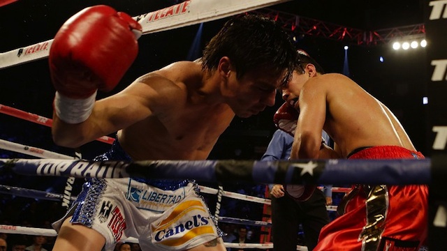 LETHAL BLOW. Nonito Donaire of the Philippines (R) knocks out Jorge Arce of Mexico in the third round of their WBO World Super Bantamweight bout at the Toyota Center on December 15, 2012 in Houston, Texas. Scott Halleran/Getty Images/AFP