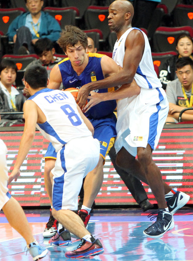 PART-TIME. Not all Hong Kong basketball players are full-time cagers. Photo by FIBA Asia/Nuki Sabio.