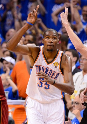 OKLAHOMA CITY, OK - JUNE 12: Kevin Durant #35 of the Oklahoma City Thunder reacts after making a shot in the second half in Game One of the 2012 NBA Finals at Chesapeake Energy Arena on June 12, 2012 in Oklahoma City, Oklahoma. Photo by Ronald Martinez/Getty Images/AFP