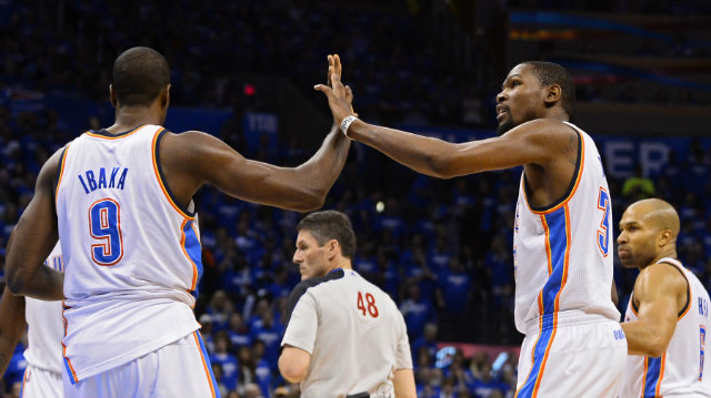 ROLLING THUNDER. Thunder players Kevin Durant and Serge Ibaka from a 2013 game. Photo by Larry W. Smith/EPA
