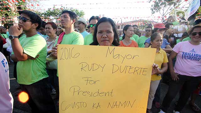 SETTING THE STAGE? Supporters of Davao City Mayor Rodrigo Duterte hold a rally in the city Saturday, March 29. Photo by Karlos Manlupig
