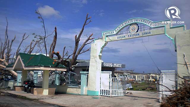DAMAGED. The gate of Eastern Samar State University survives. Photo by BJ Geronimo