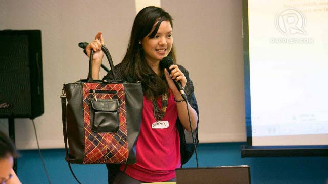 STYLISH AND EARTH-FRIENDLY. Noreen Bautista, co-founder of Jacinto & Lirio, proudly holds up one of their bags