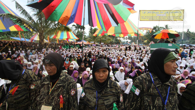 ASPIRING FOR PEACE. Over 500,000 members and supporters of the MILF gather at Camp Darapanan in Maguindanao for the start of the 3-day Bangsamoro Leaders Assembly. Photo taken by Karlos Manlupig 