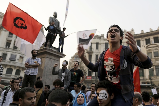MORE PROTESTS. Egyptians activists shout slogans as they rally near Tahrir Square, Cairo, Egypt, November 19 2013. Photo by EPA/Al-Masry al-Youm
