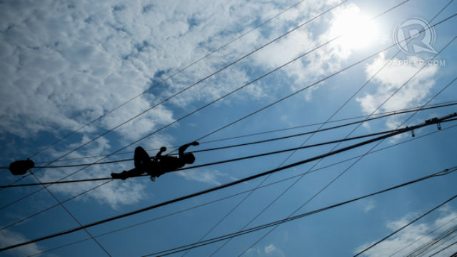 File photo of a worker repairing electrical lines in Iligan City, Mindanao. Photo by John Javellana/ Rappler
