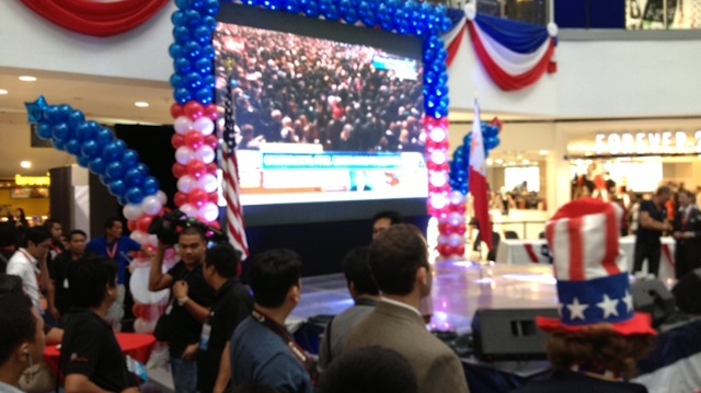 ELECTION PARTY. Americans and Filipinos follow the election recount inside the SM North Edsa Mall in Quezon City on November 7, 2012. Photo by Carlos Santamaria
