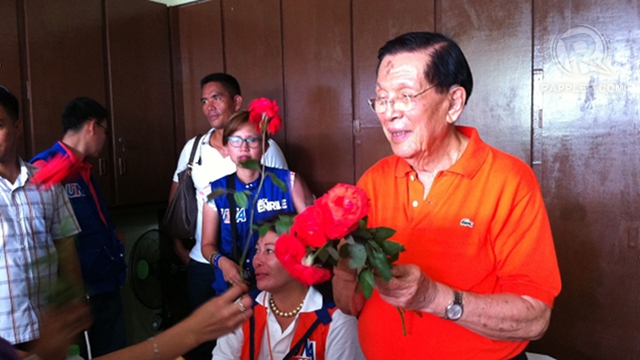 THRIVING UNA. Boholanos give Senate President Juan Ponce Enrile flowers for his 89th birthday. Enrile says his birthday wish is "for UNA to thrive." Photo by Ayee Macaraig 